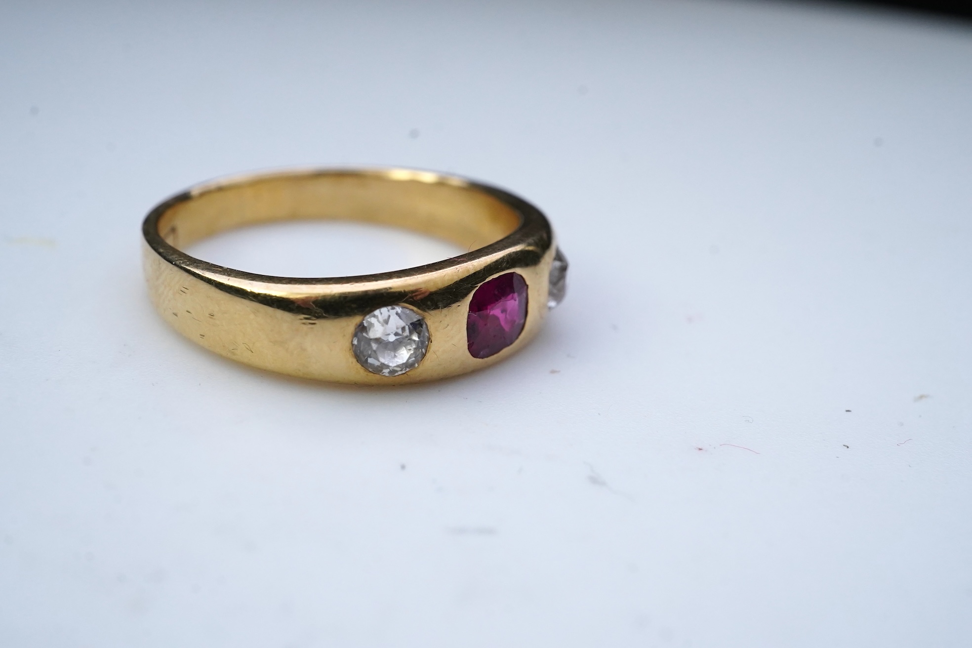 A ruby and diamond three-stone ring, early 20th century